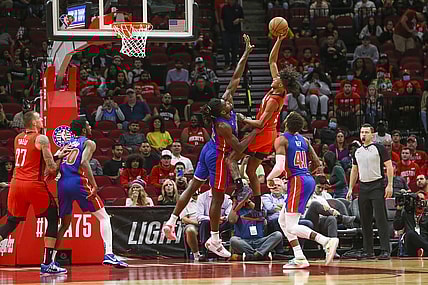 Nov 10, 2021; Houston, Texas, USA; Houston Rockets guard Jalen Green (0) shoots the ball over Detroit Pistons center Isaiah Stewart (28) in the first quarter at Toyota Center. Mandatory Credit: Thomas Shea-USA TODAY Sports