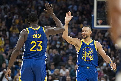 November 10, 2021; San Francisco, California, USA; Golden State Warriors forward Draymond Green (23) and guard Stephen Curry (30) celebrate against the Minnesota Timberwolves during the second quarter at Chase Center. Mandatory Credit: Kyle Terada-USA TODAY Sports