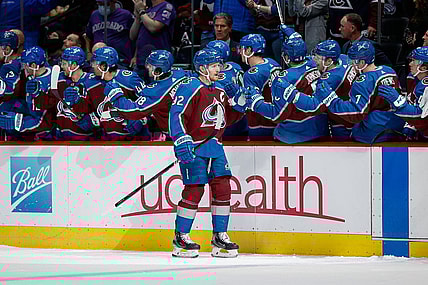 Nov 11, 2021; Denver, Colorado, USA; Colorado Avalanche left wing Gabriel Landeskog (92) celebrates with the bench after his goal in the first period against the Vancouver Canucks at Ball Arena. Mandatory Credit: Isaiah J. Downing-USA TODAY Sports