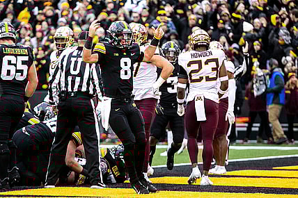 Iowa quarterback Alex Padilla (8) celebrates after scoring a touchdown during a NCAA Big Ten Conference football game against Minnesota, Saturday, Nov. 13, 2021, at Kinnick Stadium in Iowa City, Iowa.

211113 Minn Iowa Fb 019 Jpg