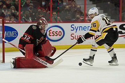 Nov 13, 2021; Ottawa, Ontario, CAN; Ottawa Senators goalie Filip Gustavsson (32) makes a save on a shot from Pittsburgh Penguins left wing Jason Zucker (16) in the first period at the Canadian Tire Centre. Mandatory Credit: Marc DesRosiers-USA TODAY Sports