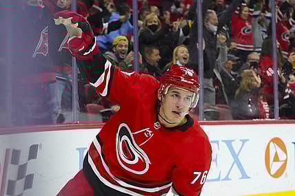 Nov 13, 2021; Raleigh, North Carolina, USA; Carolina Hurricanes defenseman Brady Skjei (76) celebrates after scoring a first period goal against the St. Louis Blues at PNC Arena. Mandatory Credit: James Guillory-USA TODAY Sports