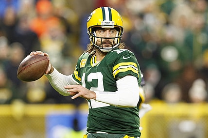 Nov 14, 2021; Green Bay, Wisconsin, USA;  Green Bay Packers quarterback Aaron Rodgers (12) throws a pass during the second quarter against the Seattle Seahawks at Lambeau Field. Mandatory Credit: Jeff Hanisch-USA TODAY Sports