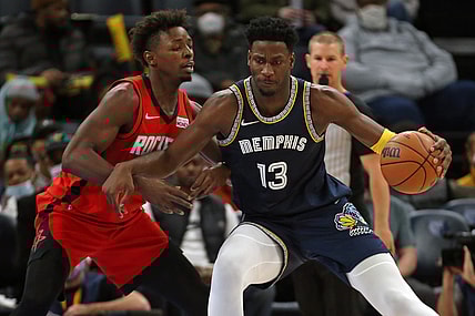 Nov 15, 2021; Memphis, Tennessee, USA; Memphis Grizzles forward Jaren Jackson Jr. (13) drives to the basket as Houston Rockets forward Jae'Sean Tate (8) defends during the first half at FedExForum. Mandatory Credit: Petre Thomas-USA TODAY Sports