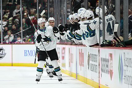 Nov 16, 2021; Saint Paul, Minnesota, USA; San Jose Sharks defenseman Erik Karlsson (65) celebrates with teammates after scoring a goal against the Minnesota Wild in the second period at Xcel Energy Center. Mandatory Credit: David Berding-USA TODAY Sports