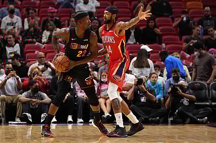 Nov 17, 2021; Miami, Florida, USA; Miami Heat forward Jimmy Butler (22) controls the ball around New Orleans Pelicans forward Brandon Ingram (14) during the first half at FTX Arena. Mandatory Credit: Jasen Vinlove-USA TODAY Sports