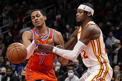 Nov 22, 2021; Atlanta, Georgia, USA; Atlanta Hawks forward Cam Reddish (22) knocks the ball away from Oklahoma City Thunder forward Darius Bazley (7) during the first half at State Farm Arena. Mandatory Credit: Dale Zanine-USA TODAY Sports