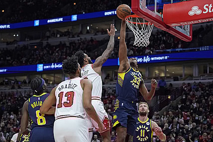 Nov 22, 2021; Chicago, Illinois, USA; Indiana Pacers center Myles Turner (33) blocks Chicago Bulls guard Coby White (0) shot during the first half at United Center. Mandatory Credit: David Banks-USA TODAY Sports