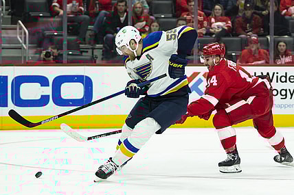 Nov 24, 2021; Detroit, Michigan, USA; St. Louis Blues defenseman Colton Parayko (55) skates past Detroit Red Wings center Robby Fabbri (14) during the first period at Little Caesars Arena. Mandatory Credit: Raj Mehta-USA TODAY Sports