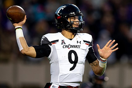 Cincinnati Bearcats quarterback Desmond Ridder (9) throws a pass in the first half of the NCAA football game between the Cincinnati Bearcats and the East Carolina Pirates at Dowdy-Ficklen Stadium in Greenville, NC, on Friday, Nov. 26, 2021.

Cincinnati Bearcats At East Carolina Pirates 20