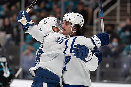 Nov 26, 2021; San Jose, California, USA;  Toronto Maple Leafs left wing Michael Bunting (58) celebrates with center Auston Matthews (34) during the second period against the San Jose Sharks at SAP Center at San Jose. Mandatory Credit: Stan Szeto-USA TODAY Sports