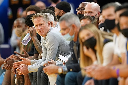 Nov 26, 2021; San Francisco, California, USA; Golden State Warriors head coach Steve Kerr sits on the bench during the fourth quarter against the Portland Trail Blazers at Chase Center. Mandatory Credit: Darren Yamashita-USA TODAY Sports