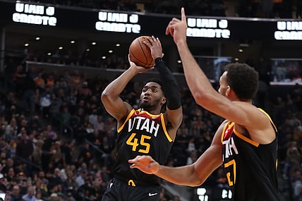 Nov 27, 2021; Salt Lake City, Utah, USA; Utah Jazz guard Donovan Mitchell (45) shoots a jump shot against the New Orleans Pelicans in the second quarter at Vivint Arena. Mandatory Credit: Rob Gray-USA TODAY Sports