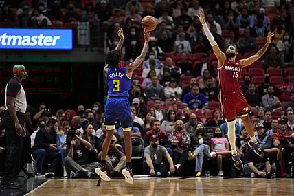 Nov 29, 2021; Miami, Florida, USA; Denver Nuggets guard Bones Hyland (3) shoots the ball over Miami Heat forward Caleb Martin (16) during the first half at FTX Arena. Mandatory Credit: Jasen Vinlove-USA TODAY Sports