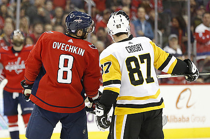 Nov 7, 2018; Washington, DC, USA; Pittsburgh Penguins center Sidney Crosby (87) and Washington Capitals left wing Alex Ovechkin (8) talk with referee Wes McCauley (4) in the third period at Capital One Arena. Mandatory Credit: Geoff Burke-USA TODAY Sports