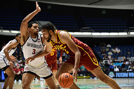 Nov 26, 2021; Anaheim, CA, USA; Southern California Trojans forward Isaiah Mobley (3) moves the ball against San Diego State Aztecs guard Matt Bradley (3) during the first half of the Wooden Legacy at Anaheim Arena. Mandatory Credit: Gary A. Vasquez-USA TODAY Sports