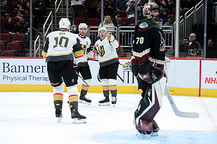Dec 3, 2021; Glendale, Arizona, USA; Vegas Golden Knights forward Jonathan Marchessault (81) celebrates his goal against Arizona Coyotes goaltender Karel Vejmelka (70) during the first period at Gila River Arena. Mandatory Credit: Joe Camporeale-USA TODAY Sports
