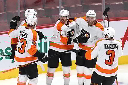 Dec 16, 2021; Montreal, Quebec, CAN; Philadelphia Flyers center Max Willman (71) celebrates his goal against Montreal Canadiens with teammates during the second period at Bell Centre. Mandatory Credit: Jean-Yves Ahern-USA TODAY Sports