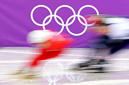 Feb 10, 2018; Pyeongchang, South Korea; Skaters goes past the Olympics Rings in the men's short track 1,500m heats during the Pyeongchang 2018 Olympic Winter Games. Mandatory Credit: Geoff Burke-USA TODAY Sports