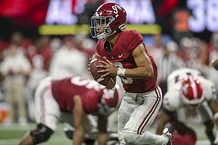 Dec 4, 2021; Atlanta, GA, USA; Alabama Crimson Tide quarterback Bryce Young (9) scrambles against the Georgia Bulldogs in the second half during the SEC championship game at Mercedes-Benz Stadium. Mandatory Credit: Brett Davis-USA TODAY Sports