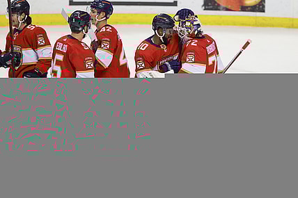 Jan 1, 2022; Sunrise, Florida, USA; Florida Panthers left wing Anthony Duclair (10) and goaltender Sergei Bobrovsky (72) celebrate after winning the game against the Montreal Canadiens at FLA Live Arena. Mandatory Credit: Sam Navarro-USA TODAY Sports