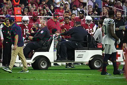 Jan 9, 2022; Glendale, Arizona, USA; Seattle Seahawks free safety Quandre Diggs (6) is carted off the field against the Arizona Cardinals during the second half at State Farm Stadium. Mandatory Credit: Joe Camporeale-USA TODAY Sports