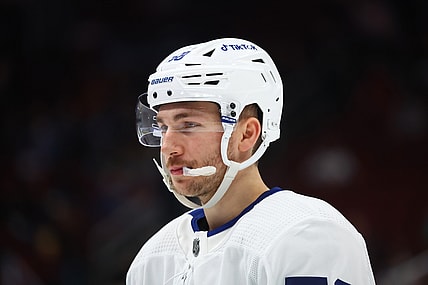 Jan 12, 2022; Glendale, Arizona, USA; Toronto Maple Leafs left wing Michael Bunting (58) against the Arizona Coyotes at Gila River Arena. Mandatory Credit: Mark J. Rebilas-USA TODAY Sports