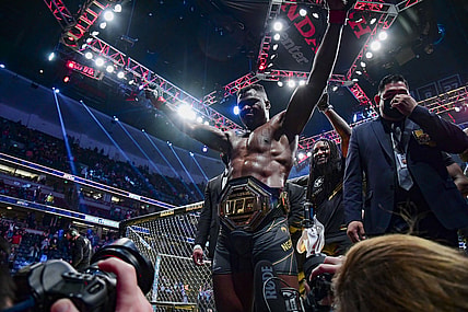 Jan 22, 2022; Anaheim, California, USA; Francis Ngannou leaves the octagon after the win against Ciryl Gane during UFC 270 at Honda Center. Mandatory Credit: Gary A. Vasquez-USA TODAY Sports