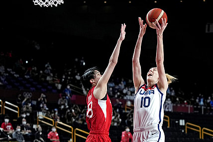 Aug 8, 2021; Saitama, Japan; United States forward Breanna Stewart (10) shoots the ball against Japan centre Maki Takada (8) in the women's basketball gold medal match during the Tokyo 2020 Olympic Summer Games at Saitama Super Arena. Mandatory Credit: James Lang-USA TODAY Sports