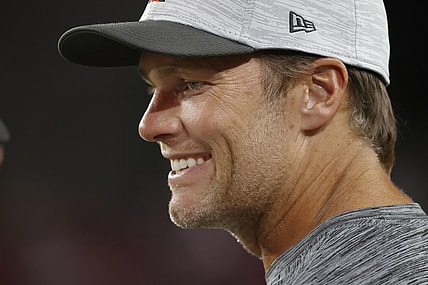 Aug 21, 2021; Tampa, Florida, USA; Tampa Bay Buccaneers quarterback Tom Brady (12) smiles on the sidelines during the second quarter against the Tennessee Titans at Raymond James Stadium. Mandatory Credit: Kim Klement-USA TODAY Sports