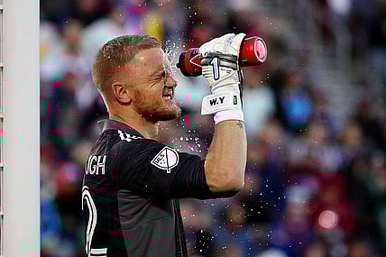 Nov 25, 2021; Commerce City, CO, USA; Colorado Rapids goalkeeper William Yarbrough (22) cools off with a water bottle during the second half against the Portland Timbers at Dick's Sporting Goods Park. Mandatory Credit: Ron Chenoy-USA TODAY Sports