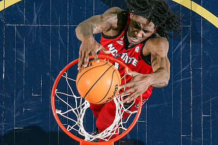 Jan 26, 2022; South Bend, Indiana, USA; North Carolina State Wolfpack guard Dereon Seabron (1) dunks in the first half against the Notre Dame Fighting Irish at the Purcell Pavilion. Mandatory Credit: Matt Cashore-USA TODAY Sports