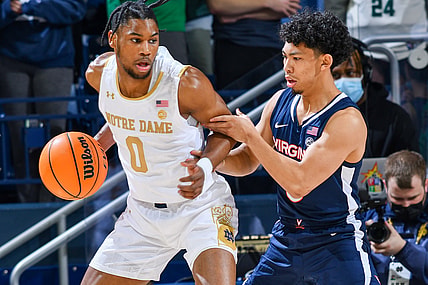 Jan 29, 2022; South Bend, Indiana, USA; Notre Dame Fighting Irish guard Blake Wesley (0) dribbles as Virginia Cavaliers guard Kihei Clark (0) defends in the first half at the Purcell Pavilion. Mandatory Credit: Matt Cashore-USA TODAY Sports