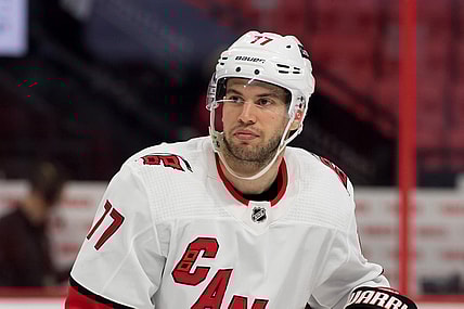 Feb 8, 2022; Ottawa, Ontario, CAN; Carolina Hurricanes defenseman Tony DeAngelo (77) skates during a break in the second period against the Ottawa Senators at the Canadian Tire Centre. Mandatory Credit: Marc DesRosiers-USA TODAY Sports