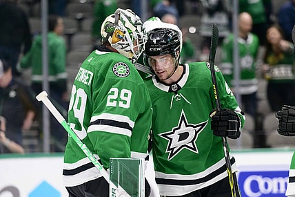 Feb 9, 2022; Dallas, Texas, USA; Dallas Stars goaltender Jake Oettinger (29) and defenseman Miro Heiskanen (4) celebrate the win over the Nashville Predators at the American Airlines Center. Mandatory Credit: Jerome Miron-USA TODAY Sports
