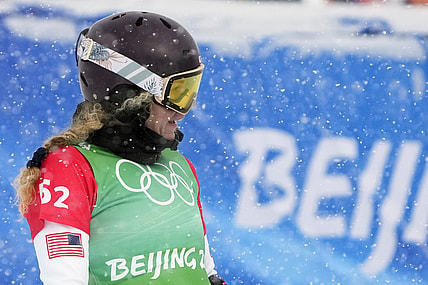 Feb 12, 2022; Zhangjiakou, China; Lindsey Jacobellis (USA) competes in the mixed snowboard cross during the Beijing 2022 Olympic Winter Games at Genting Snow Park. Mandatory Credit: Jack Gruber-USA TODAY Sports