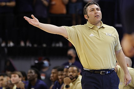 Feb 12, 2022; Charlottesville, Virginia, USA; Georgia Tech Yellow Jackets head coach Josh Pastner gestures towards a referee from the bench against the Virginia Cavaliers during the second half at John Paul Jones Arena. Mandatory Credit: Geoff Burke-USA TODAY Sports
