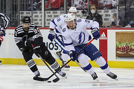 Feb 15, 2022; Newark, New Jersey, USA; Tampa Bay Lightning center Brayden Point (21) skates with the puck against the New Jersey Devils during the first period at Prudential Center. Mandatory Credit: Ed Mulholland-USA TODAY Sports