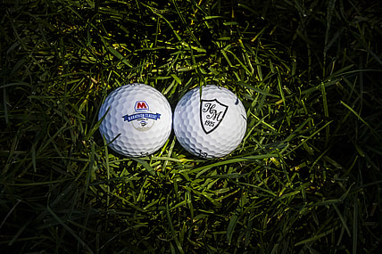 Aug 9, 2020; Sylvania, OH, USA;  Marathon Classic and Highland Meadow Logo Golf balls during the final round of the Marathon LPGA Classic golf tournament at Highlands Meadows Golf Club. Mandatory Credit: Marc Lebryk-USA TODAY Sports