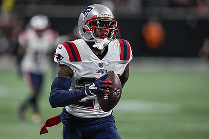 Nov 18, 2021; Atlanta, Georgia, USA; New England Patriots cornerback J.C. Jackson (27) runs after intercepting a pass against the Atlanta Falcons during the fourth quarter at Mercedes-Benz Stadium. Mandatory Credit: Dale Zanine-USA TODAY Sports