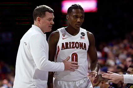 Feb 3, 2022; Tucson, Arizona, USA; Arizona Wildcats head coach Tommy Lloyd talks with guard Bennedict Mathurin (0) during the first half against the UCLA Bruins at McKale Center. Mandatory Credit: The Wildcats beat the Bruins 76-66. Chris Coduto-USA TODAY Sports