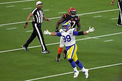 Feb 13, 2022; Inglewood, California, USA; Los Angeles Rams defensive end Aaron Donald (99) celebrates in the fourth quarter against the Cincinnati Bengals in Super Bowl LVI at SoFi Stadium. The Rams defeated the Bengals 23-20. Mandatory Credit: Kirby Lee-USA TODAY Sports