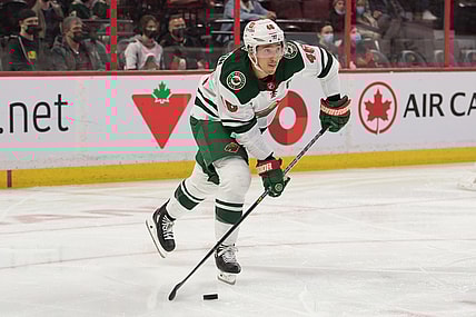 Feb 22, 2022; Ottawa, Ontario, CAN; Minnesota Wild defenseman Jared Spurgeon (46) skates with the puck in the second period against the Ottawa Senators at the Canadian Tire Centre. Mandatory Credit: Marc DesRosiers-USA TODAY Sports