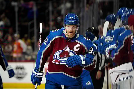 Mar 5, 2022; Denver, Colorado, USA; Colorado Avalanche left wing Gabriel Landeskog (92) celebrates his first period  goal against the Calgary Flames at Ball Arena. Mandatory Credit: Ron Chenoy-USA TODAY Sports