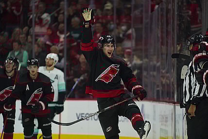 Mar 6, 2022; Raleigh, North Carolina, USA; Carolina Hurricanes center Martin Necas (88) celebrates his goal against the Seattle Kraken during the third period at PNC Arena. Mandatory Credit: James Guillory-USA TODAY Sports