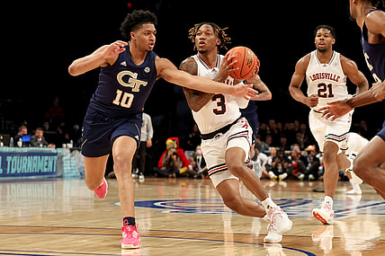 Mar 8, 2022; Brooklyn, NY, USA; Louisville Cardinals guard El Ellis (3) drives to the basket against Georgia Tech Yellow Jackets guard Dallan Coleman (10) during the first half at Barclays Center. Mandatory Credit: Brad Penner-USA TODAY Sports