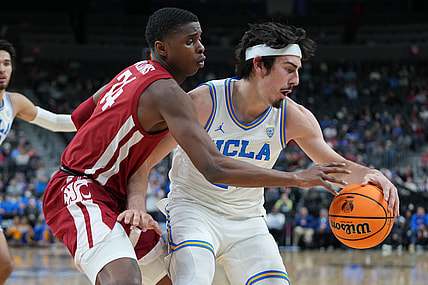 Mar 10, 2022; Las Vegas, NV, USA; Washington State Cougars guard Noah Williams (24) defends against UCLA Bruins guard Jaime Jaquez Jr. (24) during the first half at T-Mobile Arena. Mandatory Credit: Stephen R. Sylvanie-USA TODAY Sports
