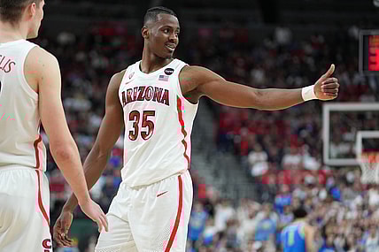 Mar 12, 2022; Las Vegas, NV, USA; Arizona Wildcats center Christian Koloko (35) reacts in a game against the UCLA Bruins during the second half at T-Mobile Arena. Mandatory Credit: Stephen R. Sylvanie-USA TODAY Sports