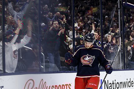 Mar 13, 2022; Columbus, Ohio, USA;  Columbus Blue Jackets center Cole Sillinger (34) celebrates scoring a goal against the Vegas Golden Knights in the second period at Nationwide Arena. Mandatory Credit: Aaron Doster-USA TODAY Sports