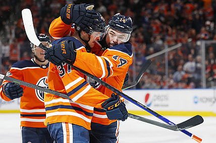 Mar 15, 2022; Edmonton, Alberta, CAN; The Edmonton Oilers celebrate a goal by forward Warren Foegele (37) during the third period against the Detroit Red Wings at Rogers Place. Mandatory Credit: Perry Nelson-USA TODAY Sports